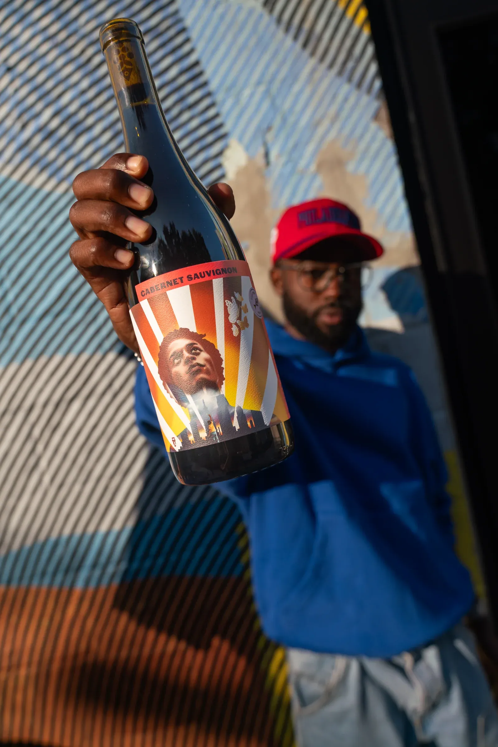 Andre Chaney working on a public mural.