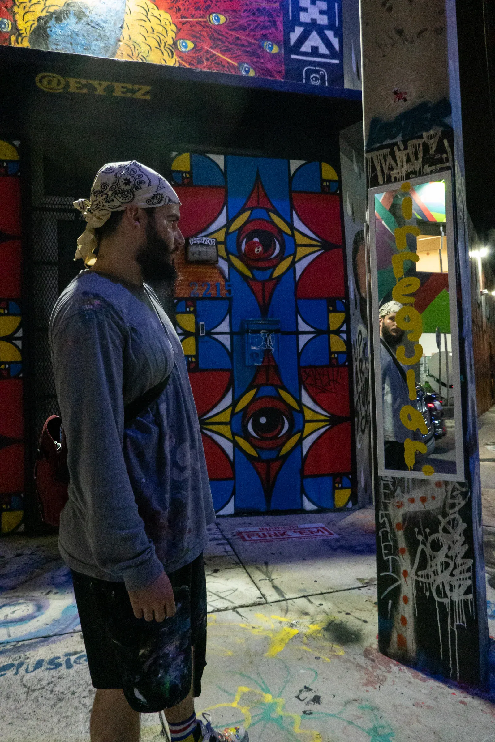 Irregular's human-shaped mirror form installed on a wall.
