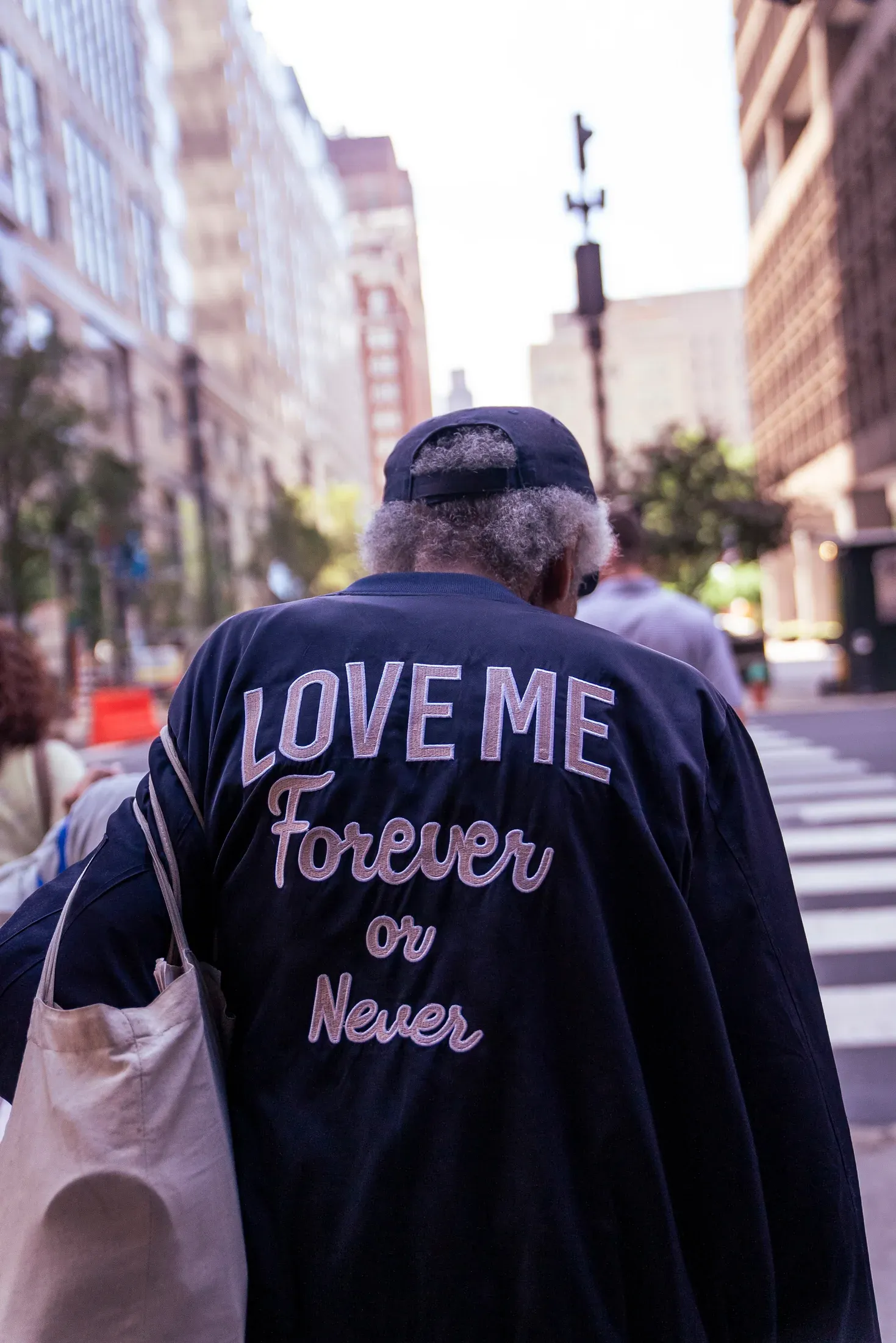 A jacket reading Love Me Forever or Never.