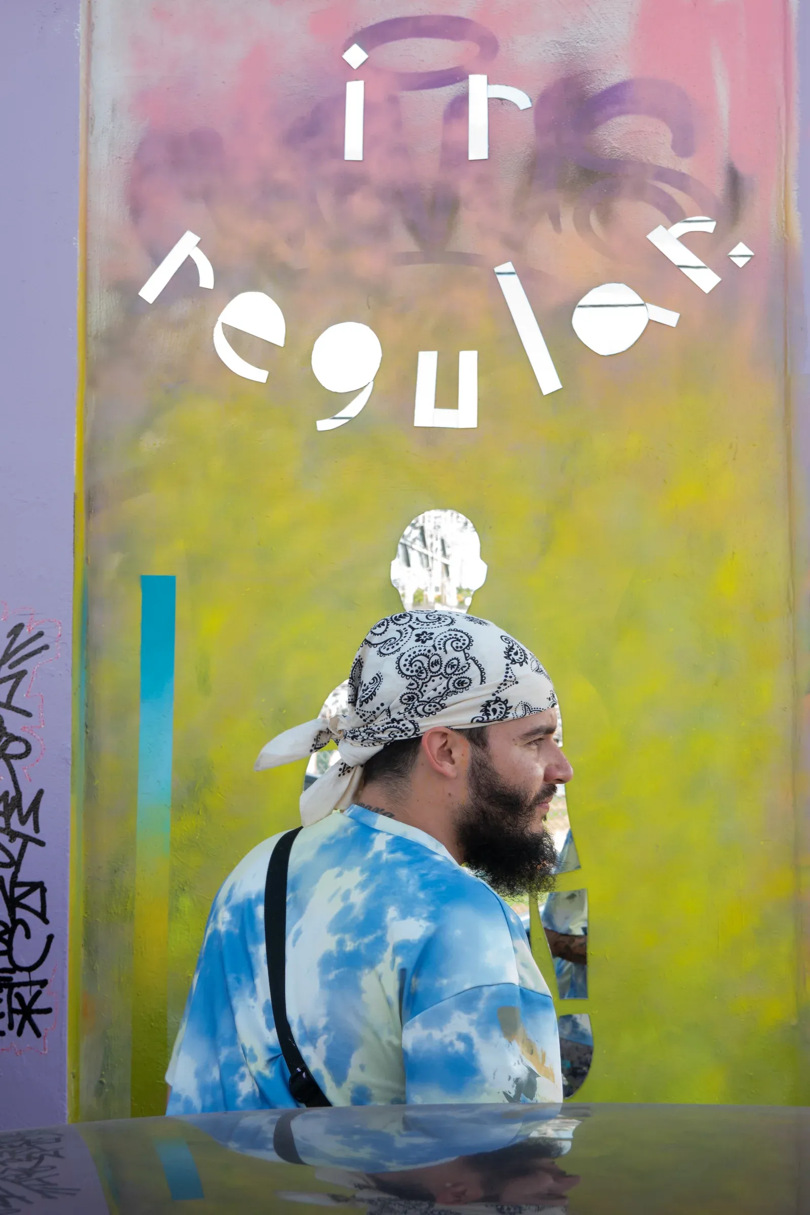 Irregular moving through Miami with his artwork.