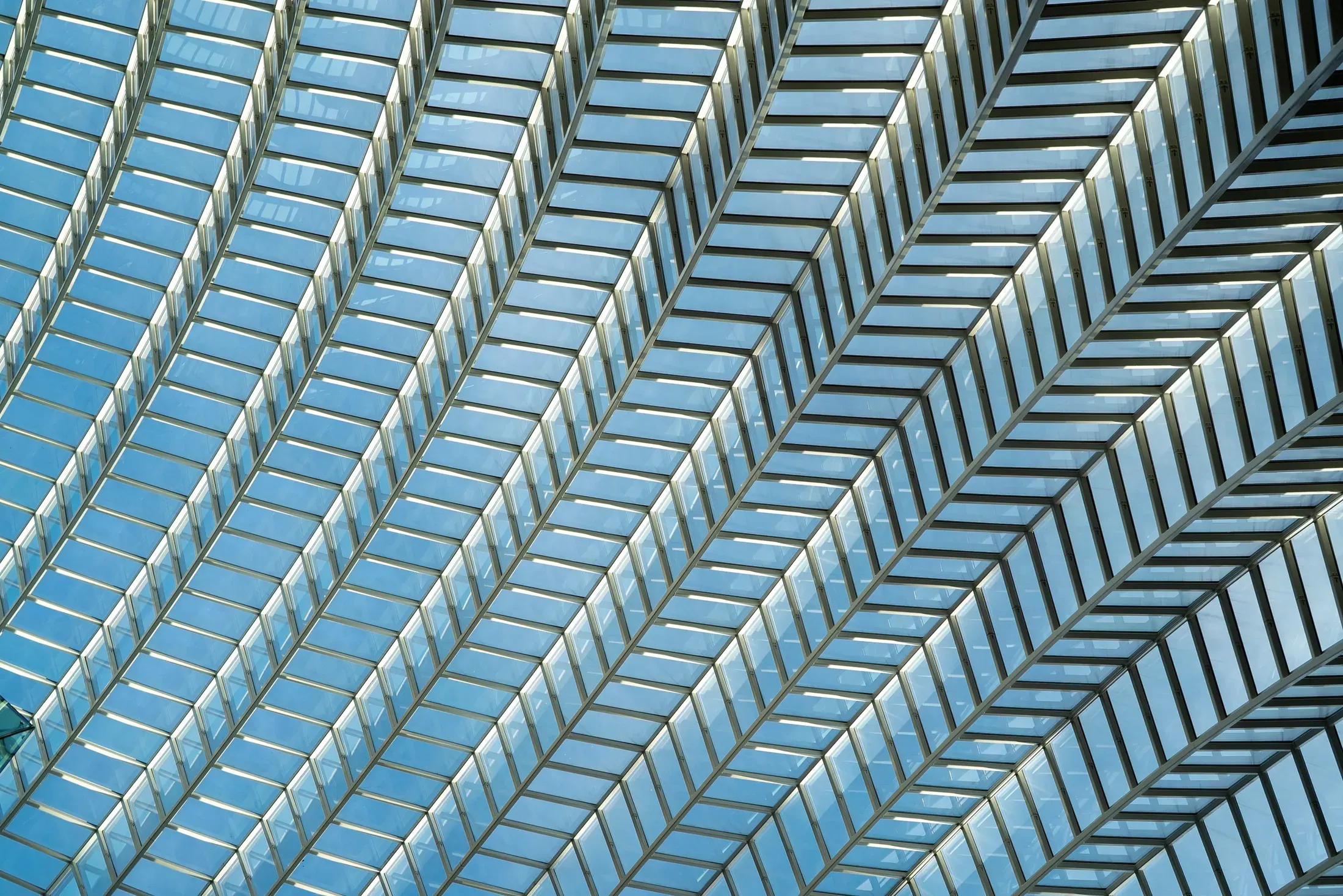 Repeating geometric forms across an urban facade.